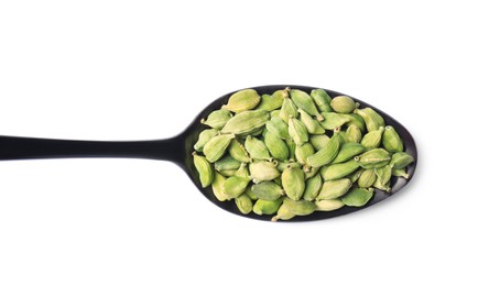 Photo of Spoon full of cardamom on white background, top view