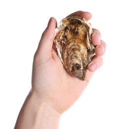 Man holding oyster on white background, closeup