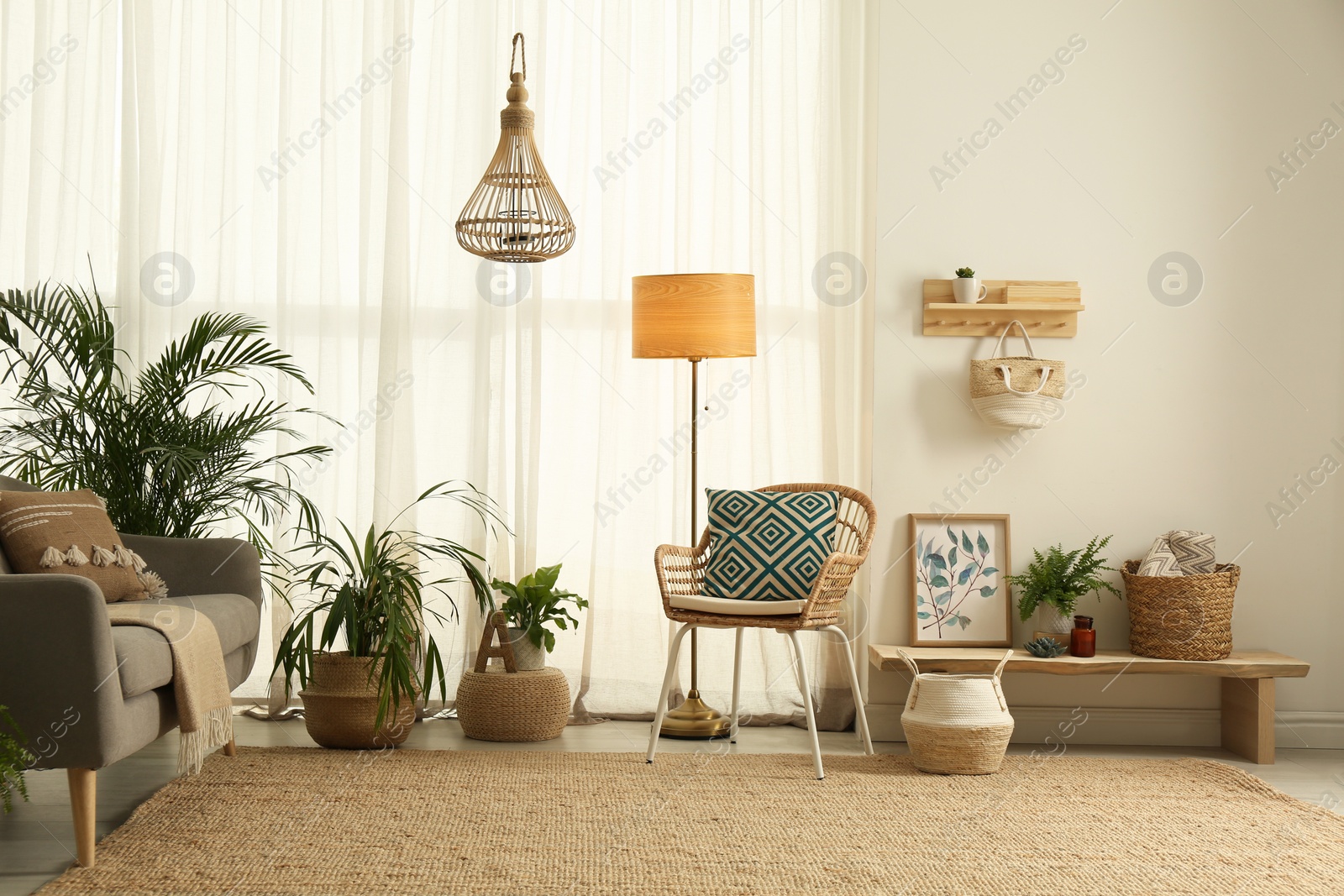 Photo of Light living room with boho decor. Interior design