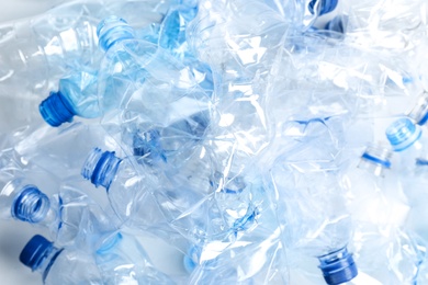 Photo of Many used plastic bottles as background, closeup. Recycling problem