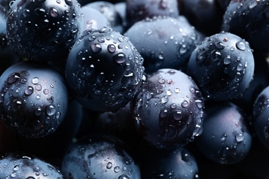 Bunch of fresh ripe juicy grapes as background. Closeup view