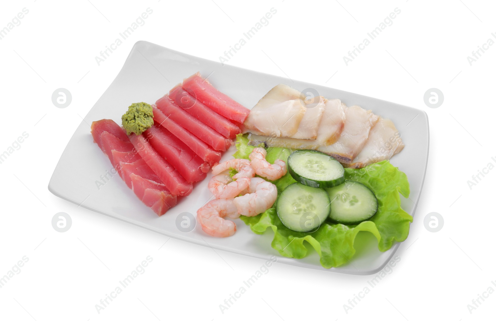 Photo of Sashimi set (raw slices of tuna, oily fish and shrimps ) served with cucumber, lettuce and vasabi isolated on white