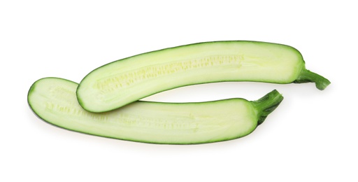 Photo of Halves of ripe zucchini on white background, top view