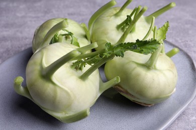 Photo of Ripe kohlrabi plants on plate, closeup view