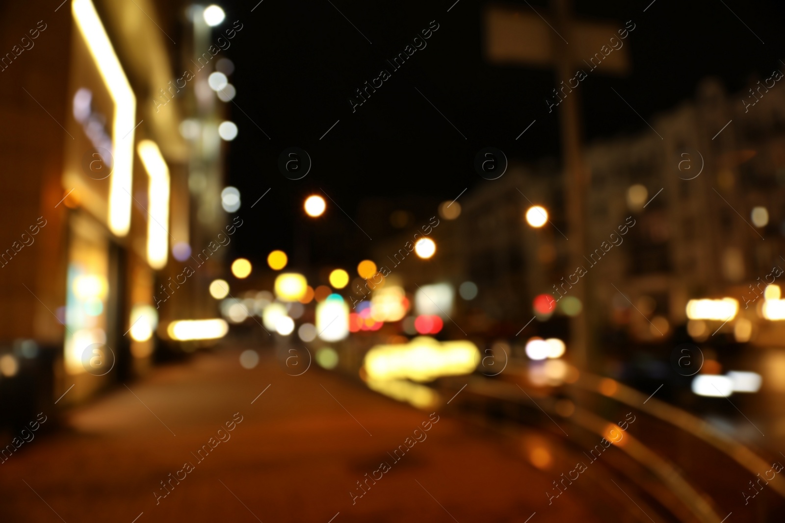 Photo of Blurred view of night cityscape with bokeh effect