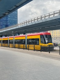 Photo of Modern running train outdoors on sunny day