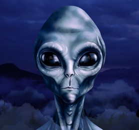 Image of UFO. Alien in mountains. Flying saucers reflecting in eyes of extraterrestrial visitor