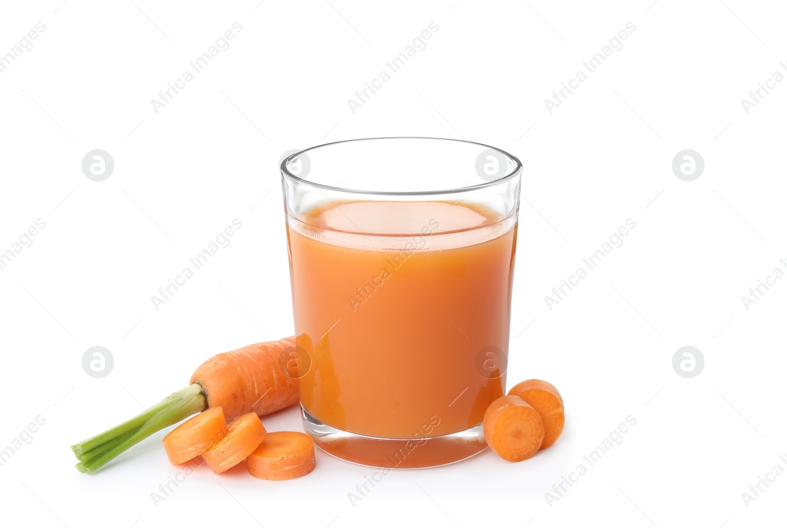 Photo of Glass with carrot juice and fresh vegetable on white background