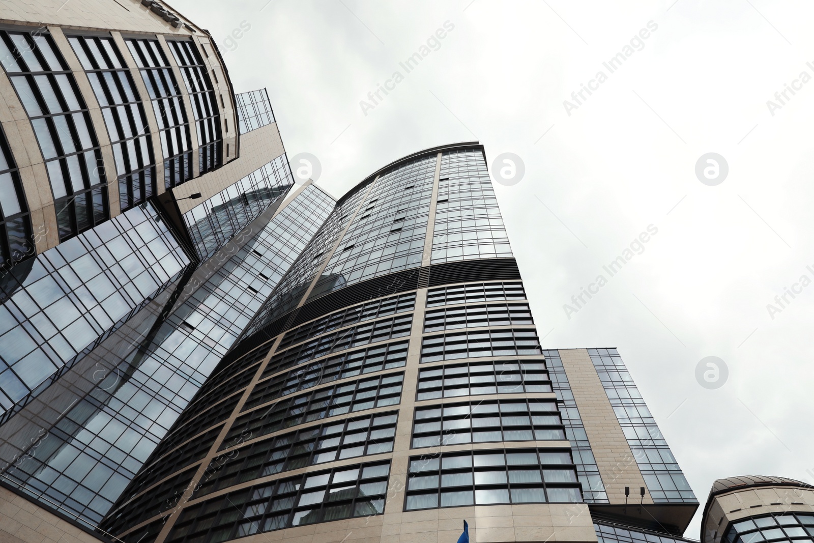 Photo of KYIV, UKRAINE - MAY 21, 2019: Low angle view of modern hotel HILTON