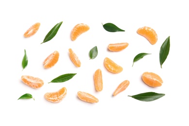 Photo of Composition with tangerine segments and leaves on white background, top view