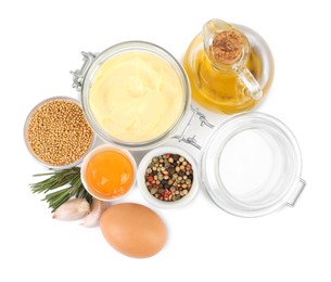 Photo of Delicious homemade mayonnaise, spices and ingredients on white background, top view