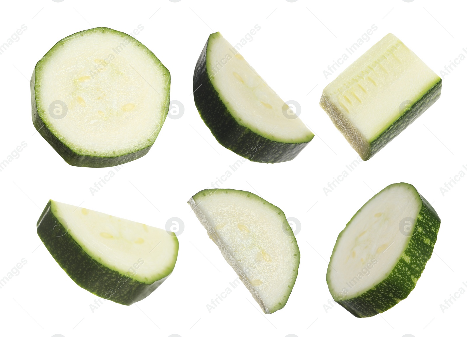 Image of Set with pieces of fresh ripe zucchini on white background