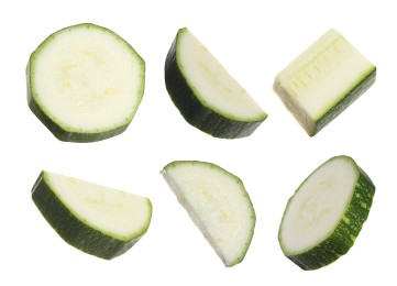 Image of Set with pieces of fresh ripe zucchini on white background