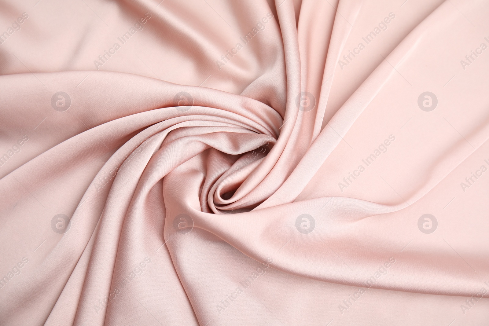 Photo of Texture of delicate pink silk as background, top view