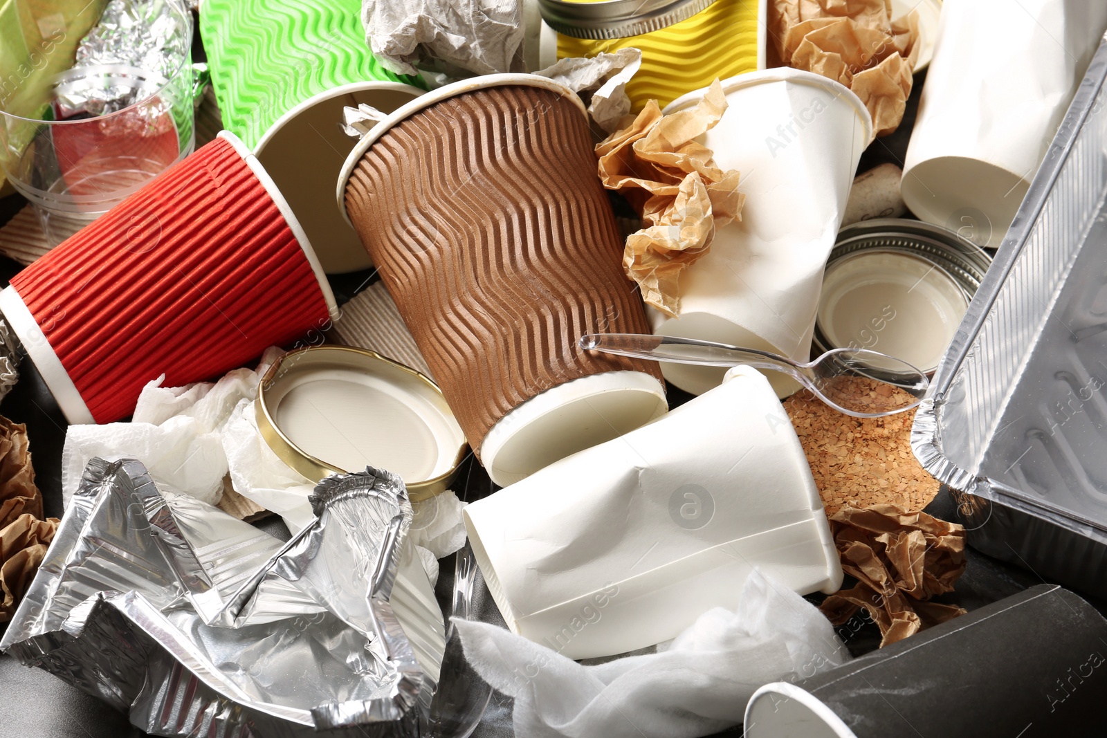 Photo of Pile of different garbage as background. Recycling problem