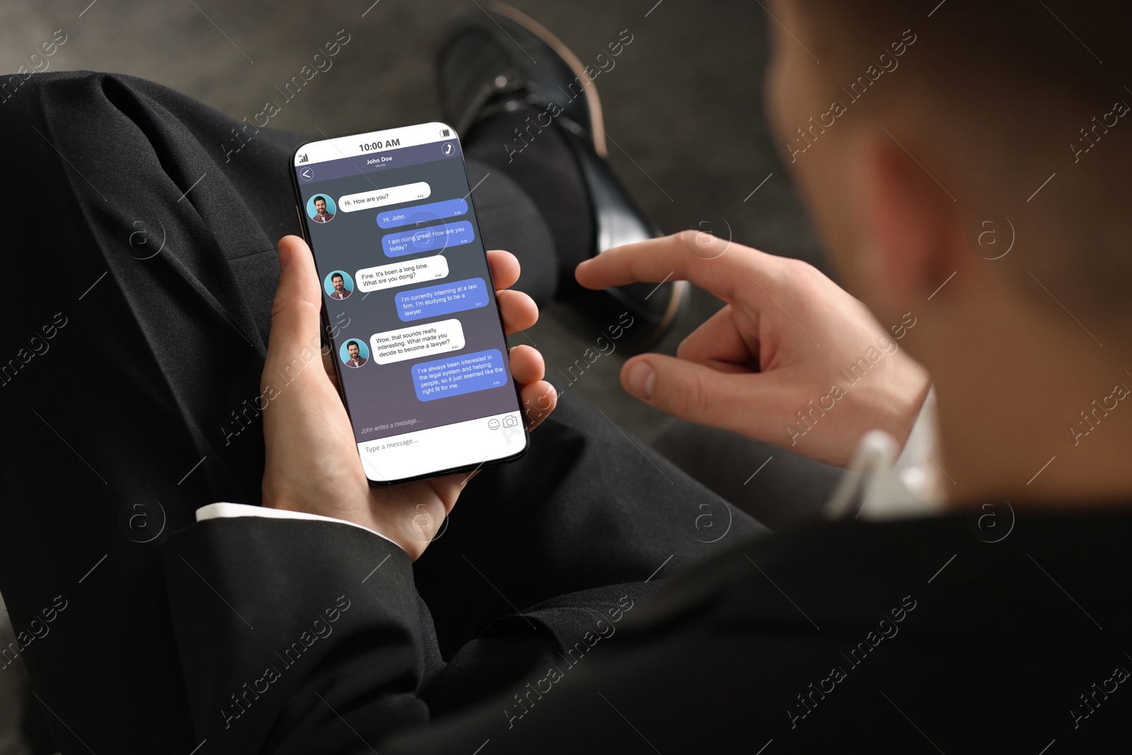 Image of Man texting via mobile phone indoors, closeup. Device screen with messages