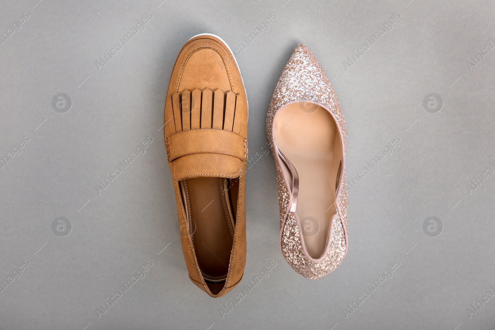 Photo of Different female shoes on color background