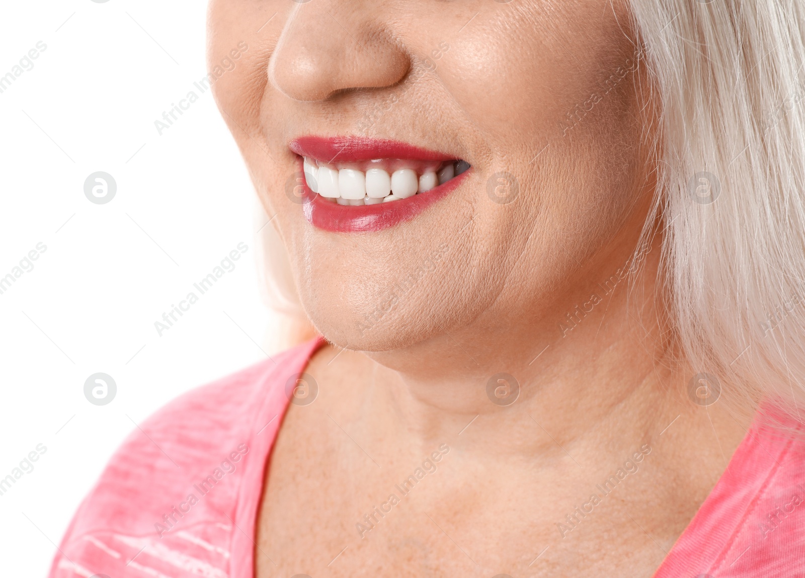 Photo of Smiling woman with perfect teeth on white background, closeup