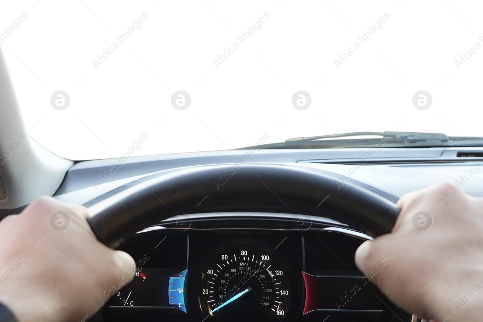 Photo of Man driving car with speedometer on dashboard, closeup