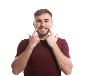 Photo of Man showing LAUGH gesture in sign language on white background