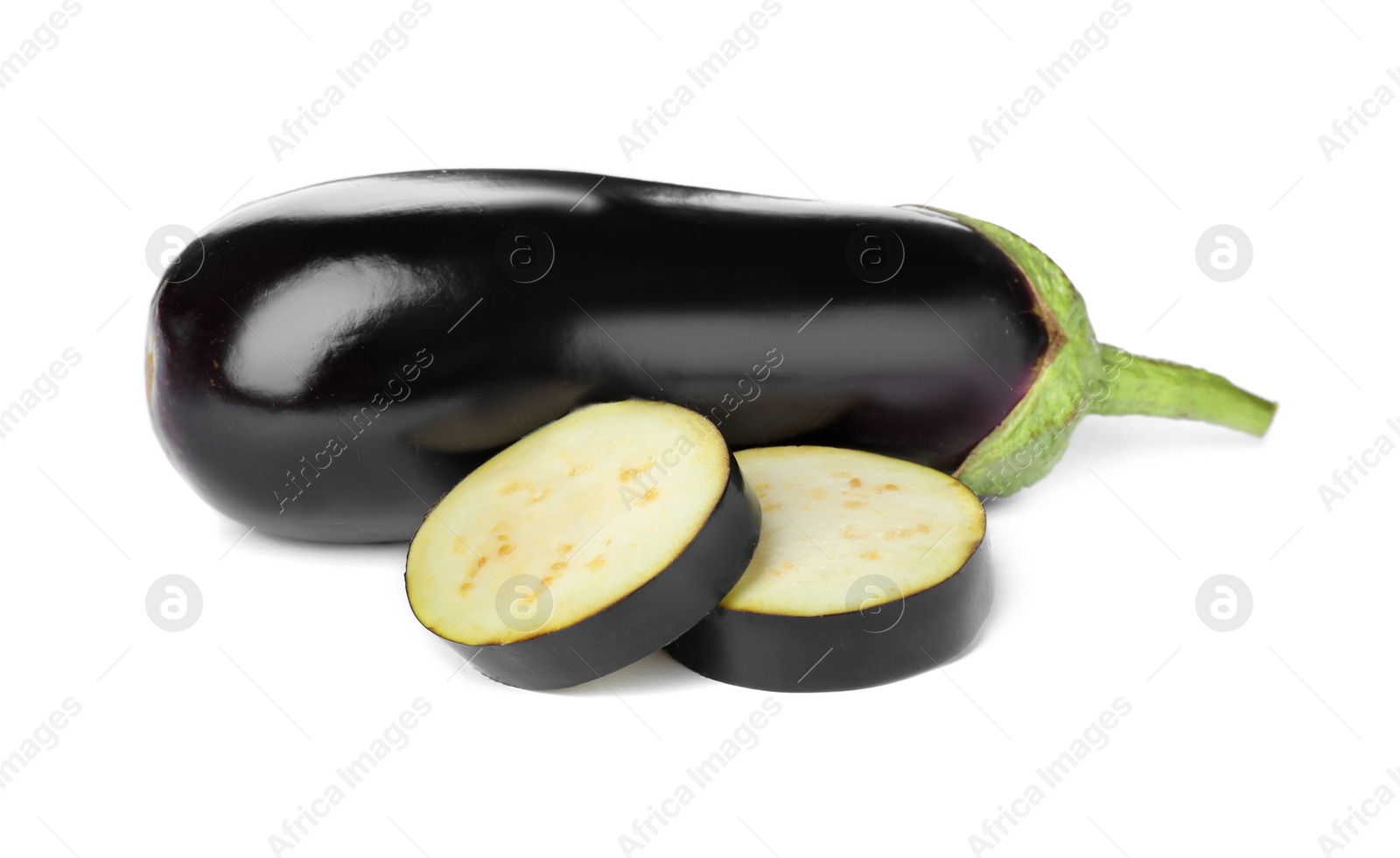 Photo of Tasty raw ripe eggplants on white background