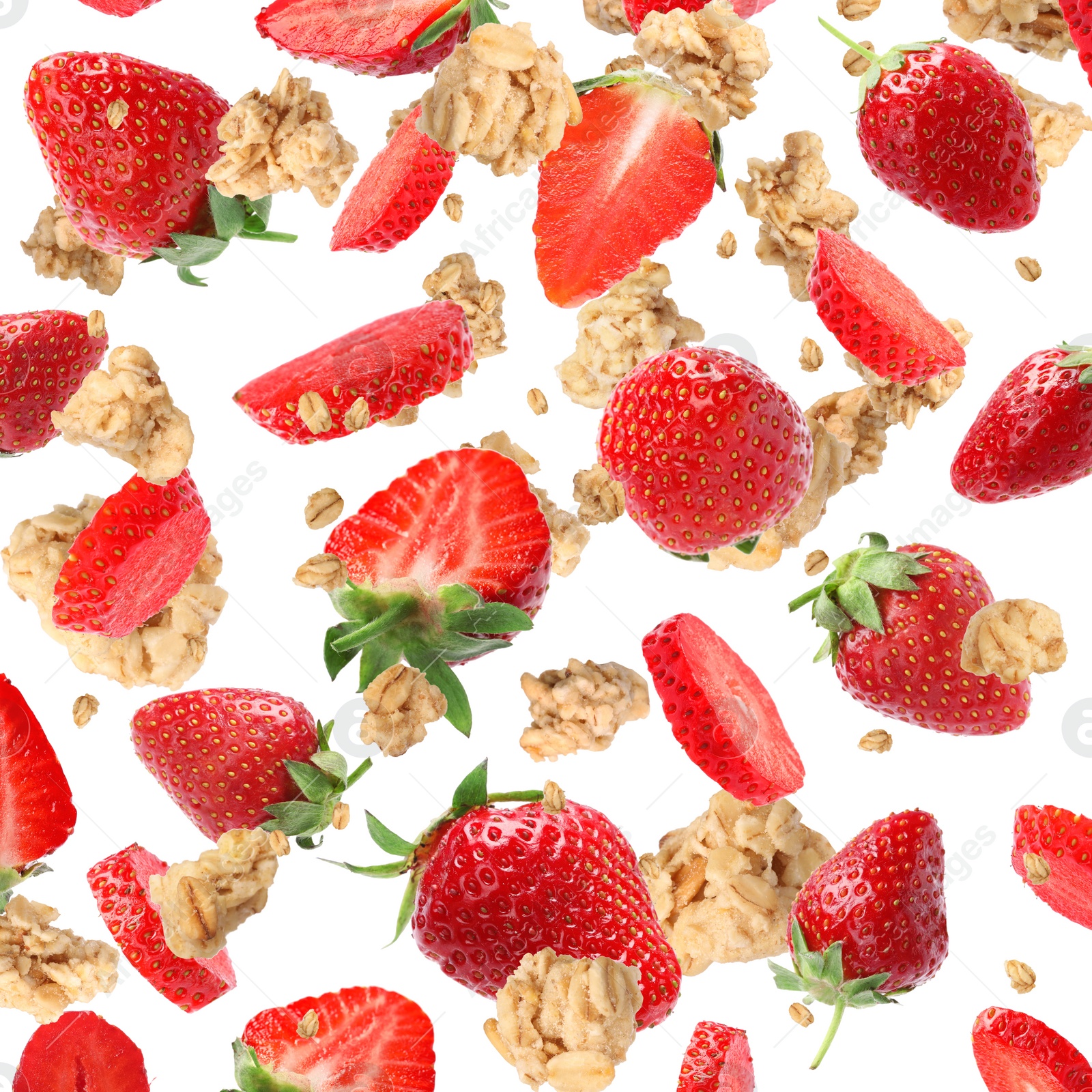 Image of Delicious granola and strawberries falling on white background. Healthy snack  