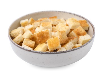 Delicious crispy croutons in bowl on white background