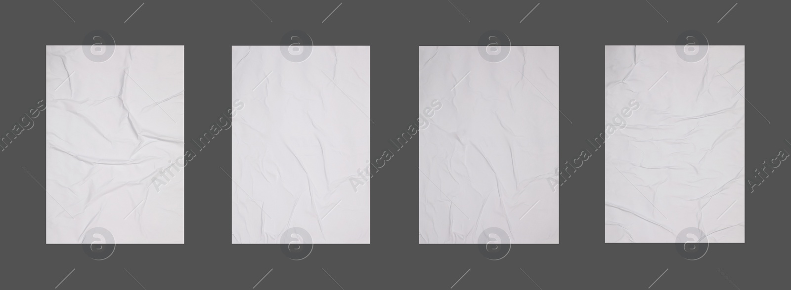 Image of Collection of creased blank posters on grey background. Banner design