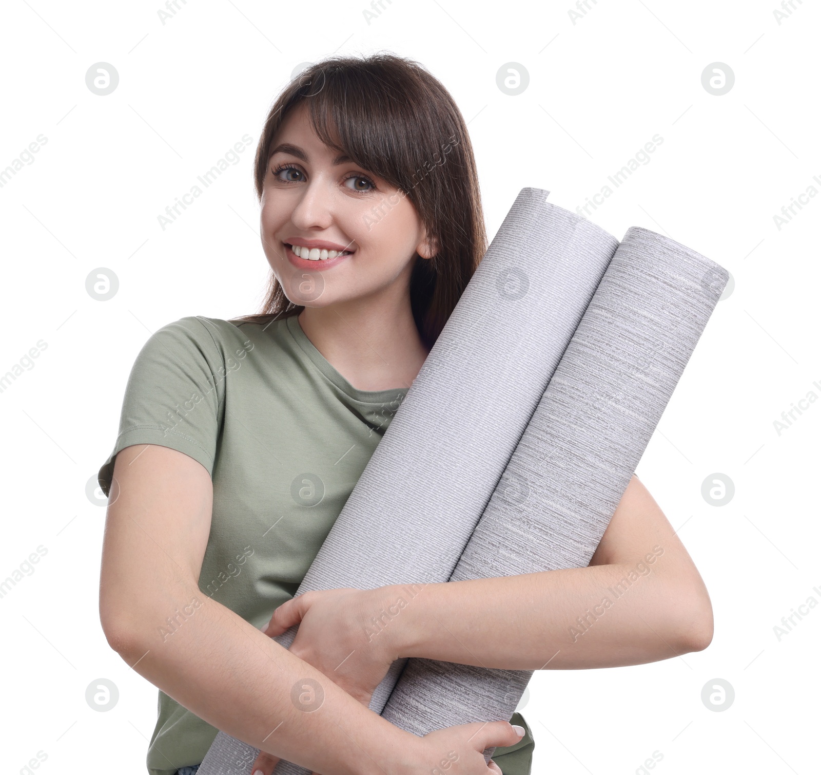 Photo of Beautiful woman with wallpaper rolls on white background