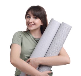 Beautiful woman with wallpaper rolls on white background