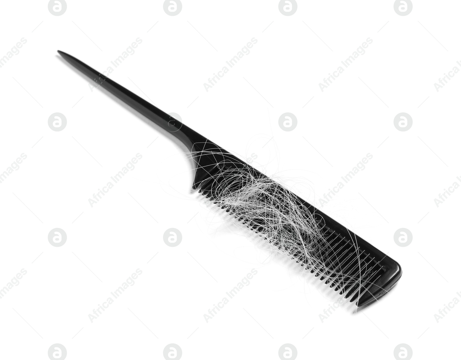 Photo of Comb with lost hair isolated on white