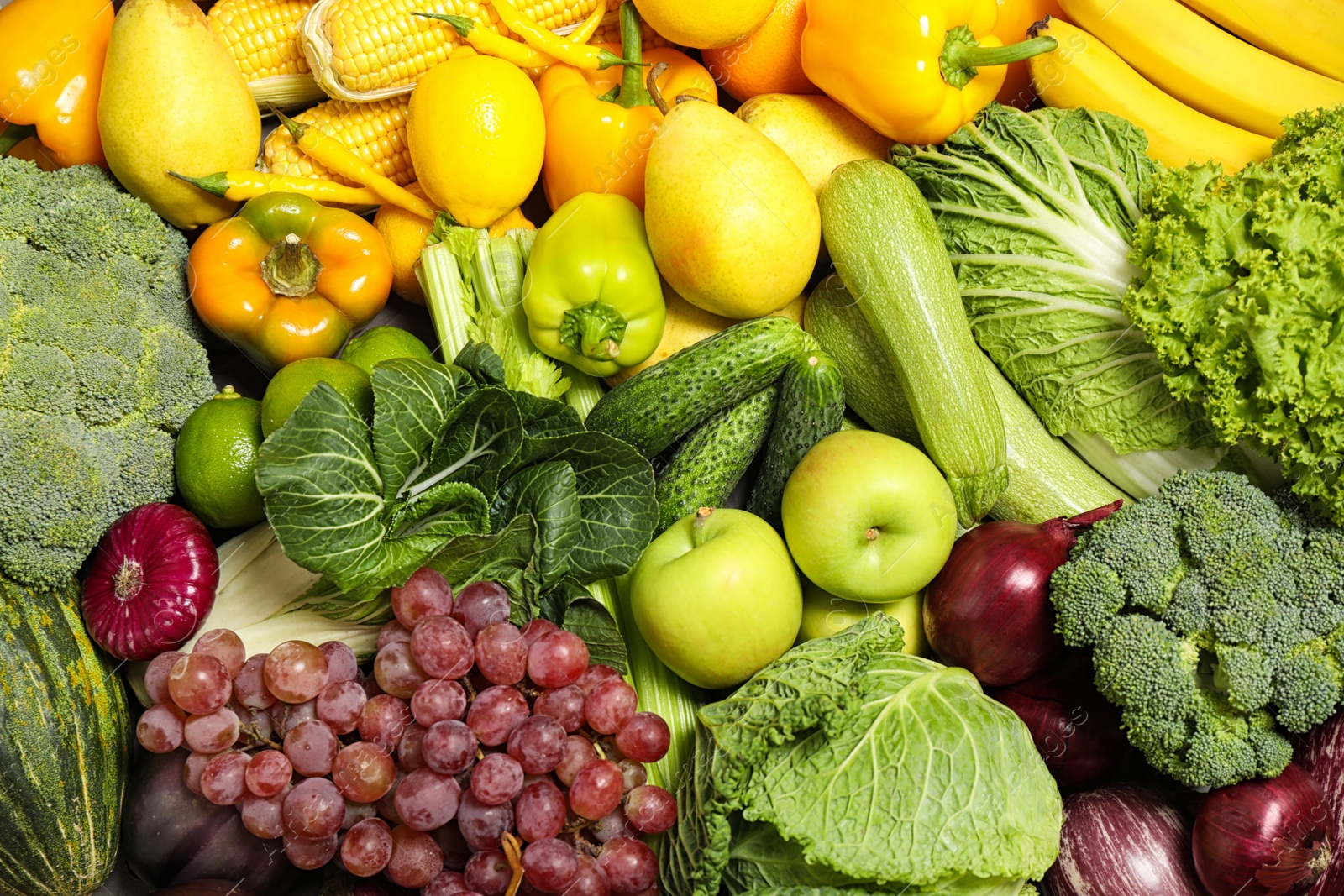 Photo of Assortment of organic fresh fruits and vegetables as background, closeup