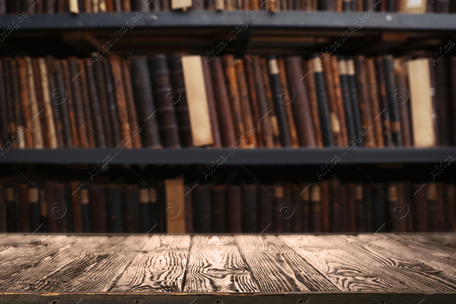 Image of Empty wooden table in library. Space for design 