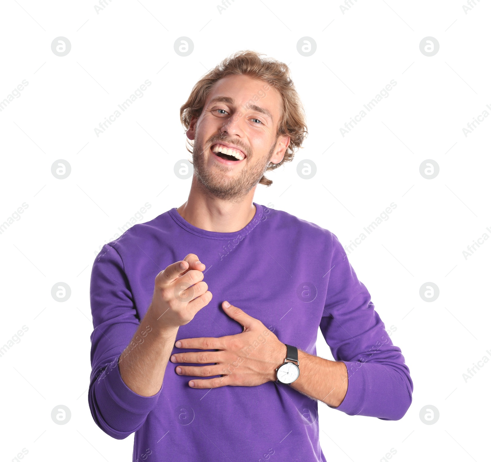 Photo of Handsome young man laughing on white background