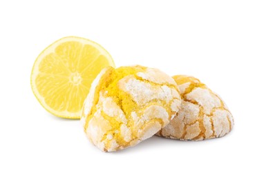 Photo of Tasty homemade lemon cookies and fresh fruit on white background