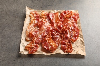 Fried bacon on grey background