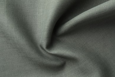 Texture of grey crumpled fabric as background, top view