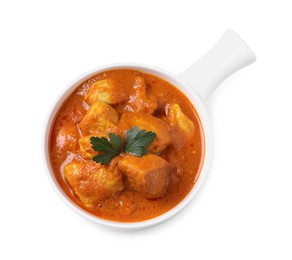 Photo of Bowl of delicious chicken curry on white background, top view