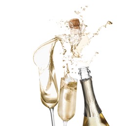 Image of Sparkling wine splashing out of bottle and glasses on white background
