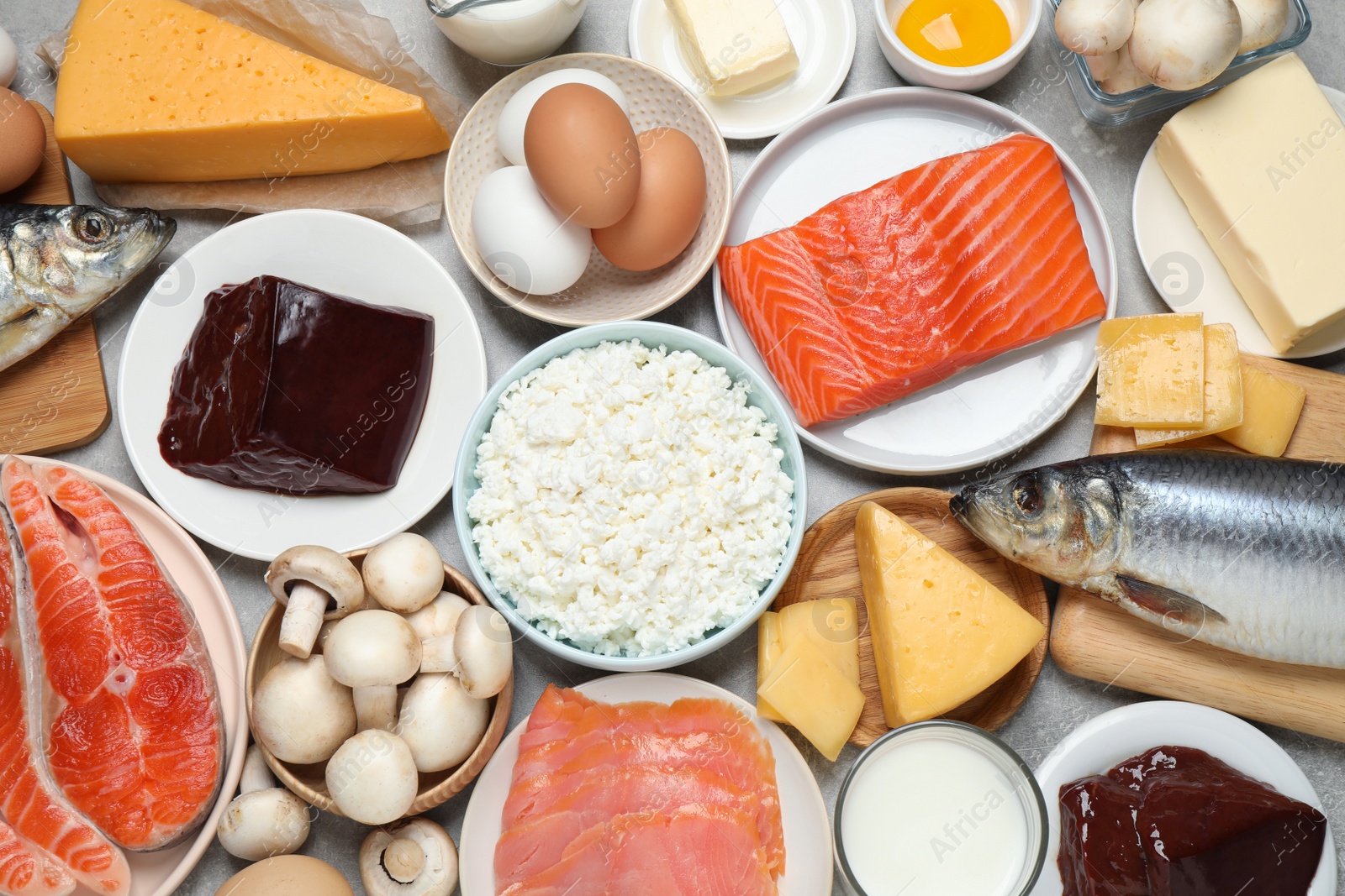 Photo of Fresh products rich in vitamin D on table, flat lay