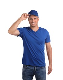 Photo of Happy man in blue cap and tshirt on white background. Mockup for design