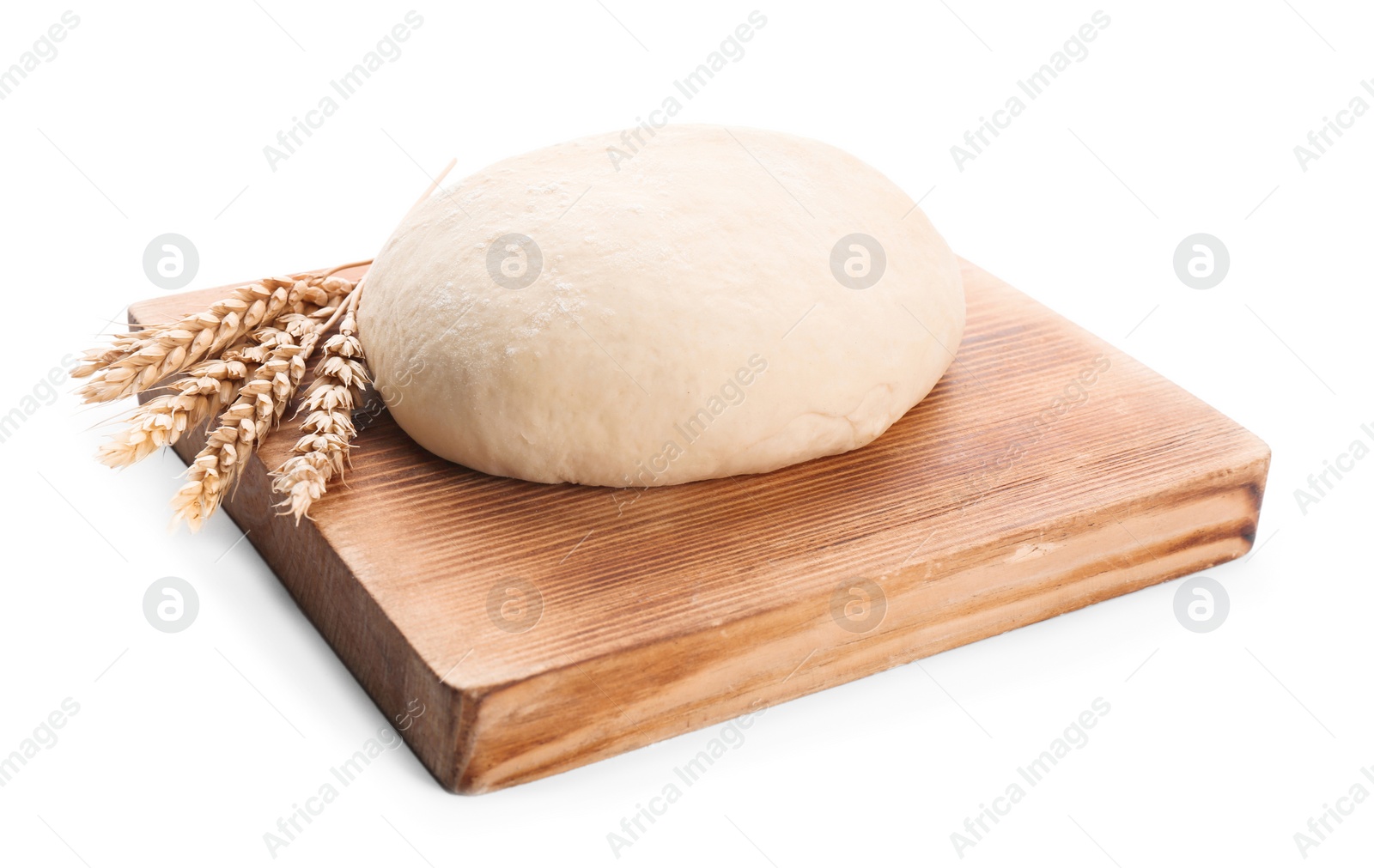 Photo of Wooden board with raw dough on white background