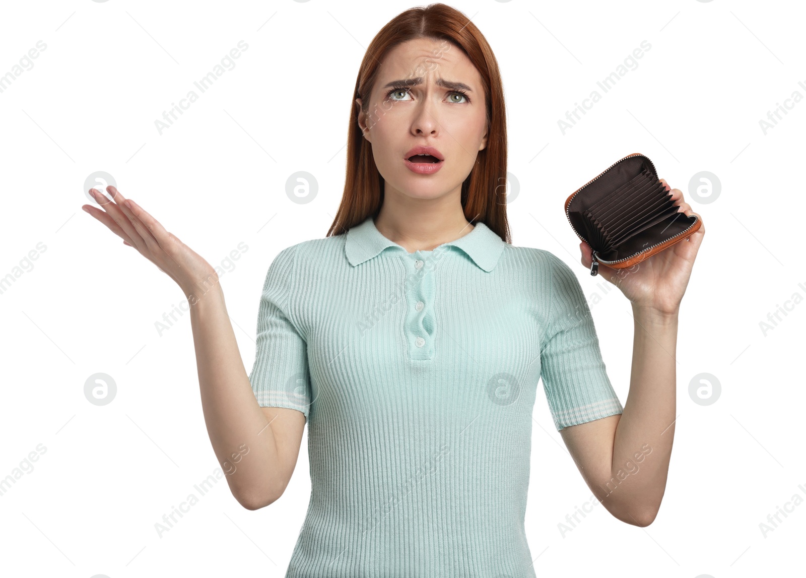 Photo of Confused woman with empty wallet on white background