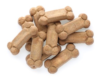 Photo of Bone shaped dog cookies on white background