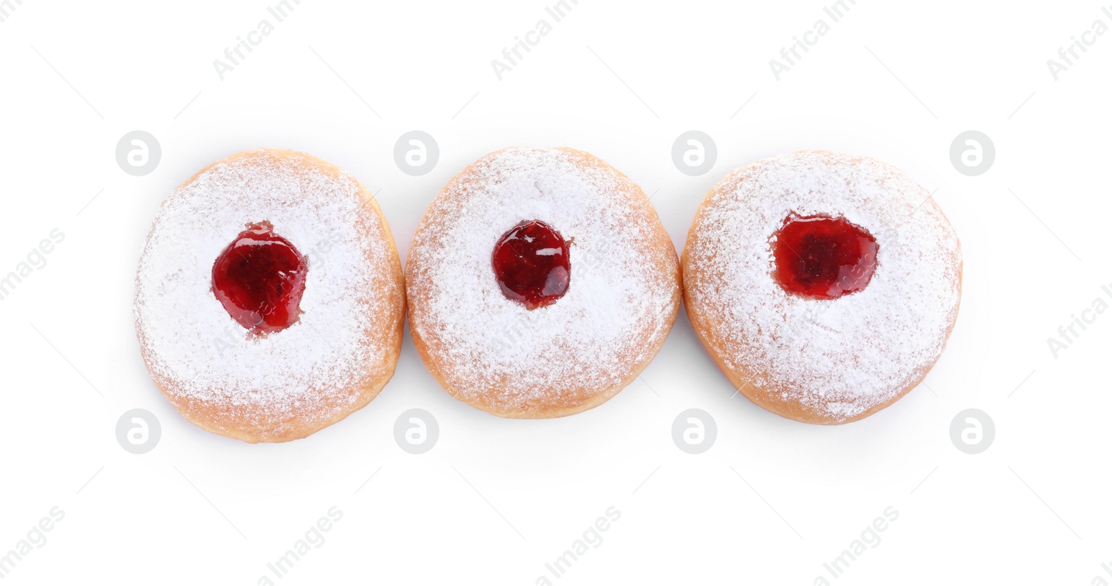 Photo of Hanukkah doughnuts with jelly and sugar powder on white background, top view