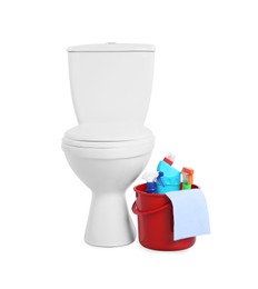 Photo of Toilet bowl and bucket with cleaning supplies on white background