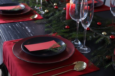 Elegant Christmas table setting with blank place cards and festive decor