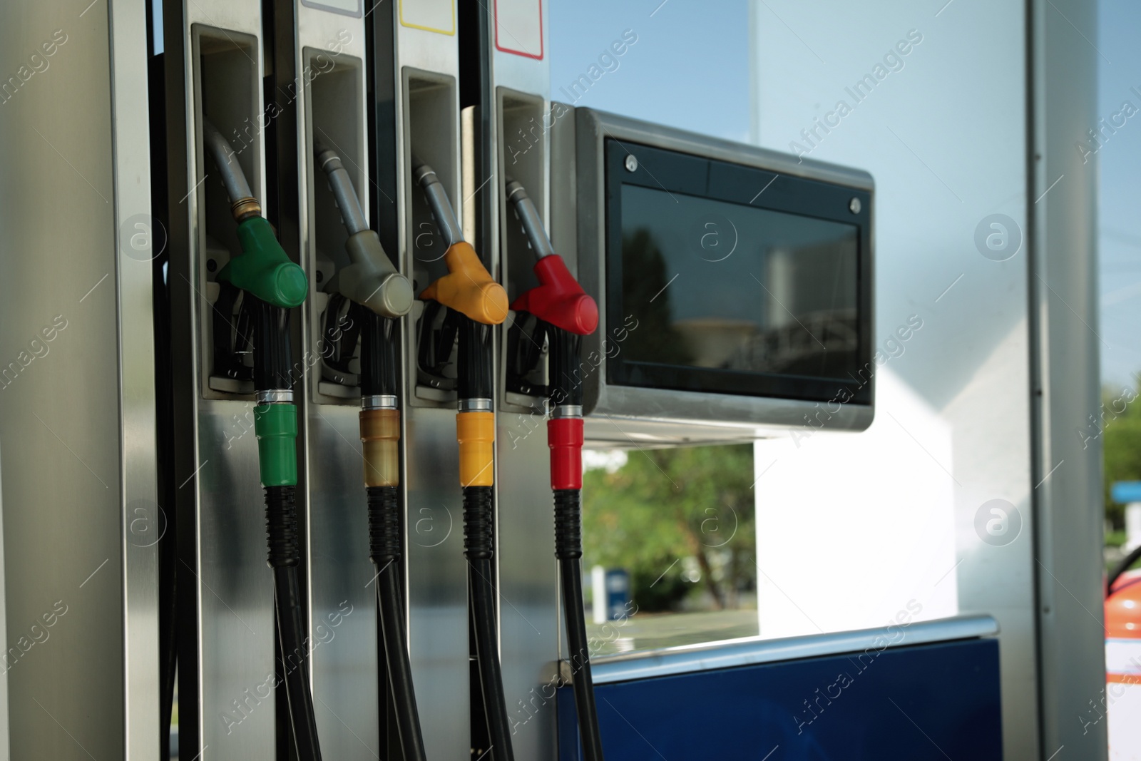 Photo of Fuel pistols at modern gas filling station