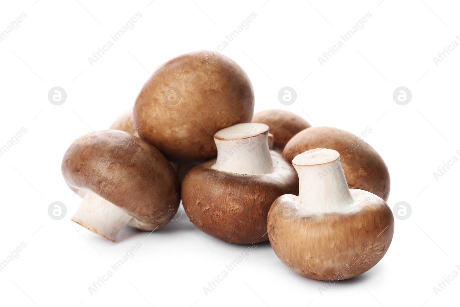 Photo of Fresh champignon mushrooms isolated on white. Healthy food