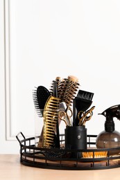 Set of hairdresser tools on table in salon